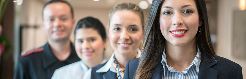 Hotel workers smiling