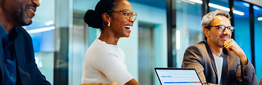 Group of professionals discussing documents during an office meeting stock photo