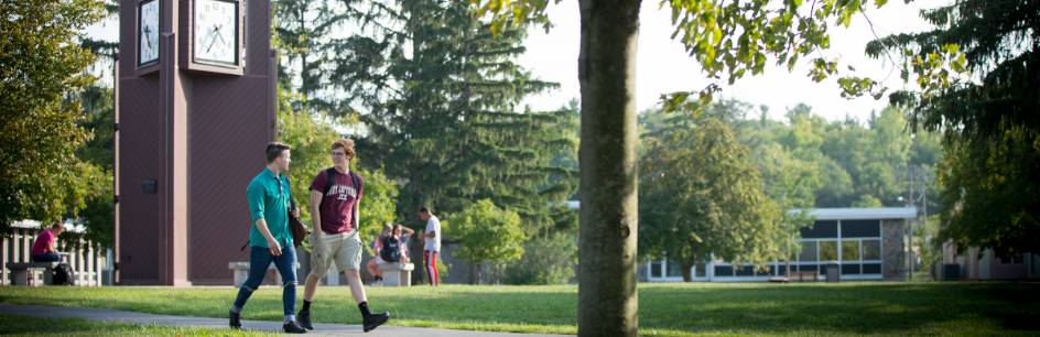 Students walk outside on campus