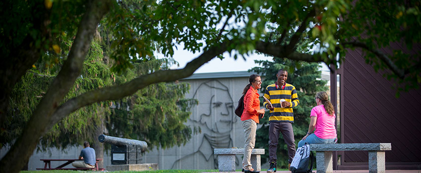 3 students on SUNY Jefferson campus