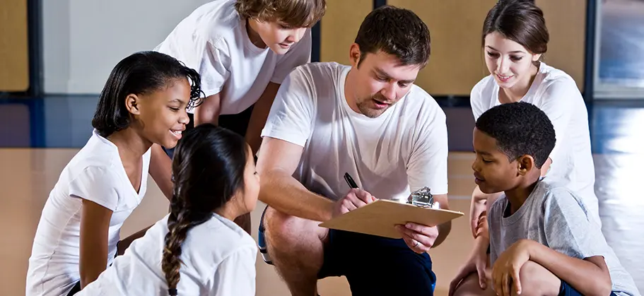 Childern with gym teacher
