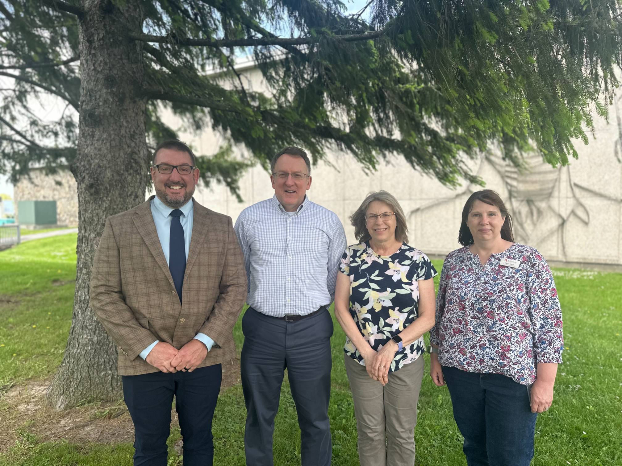 Employees Honored for 25 Years of Service, Posing with the College President