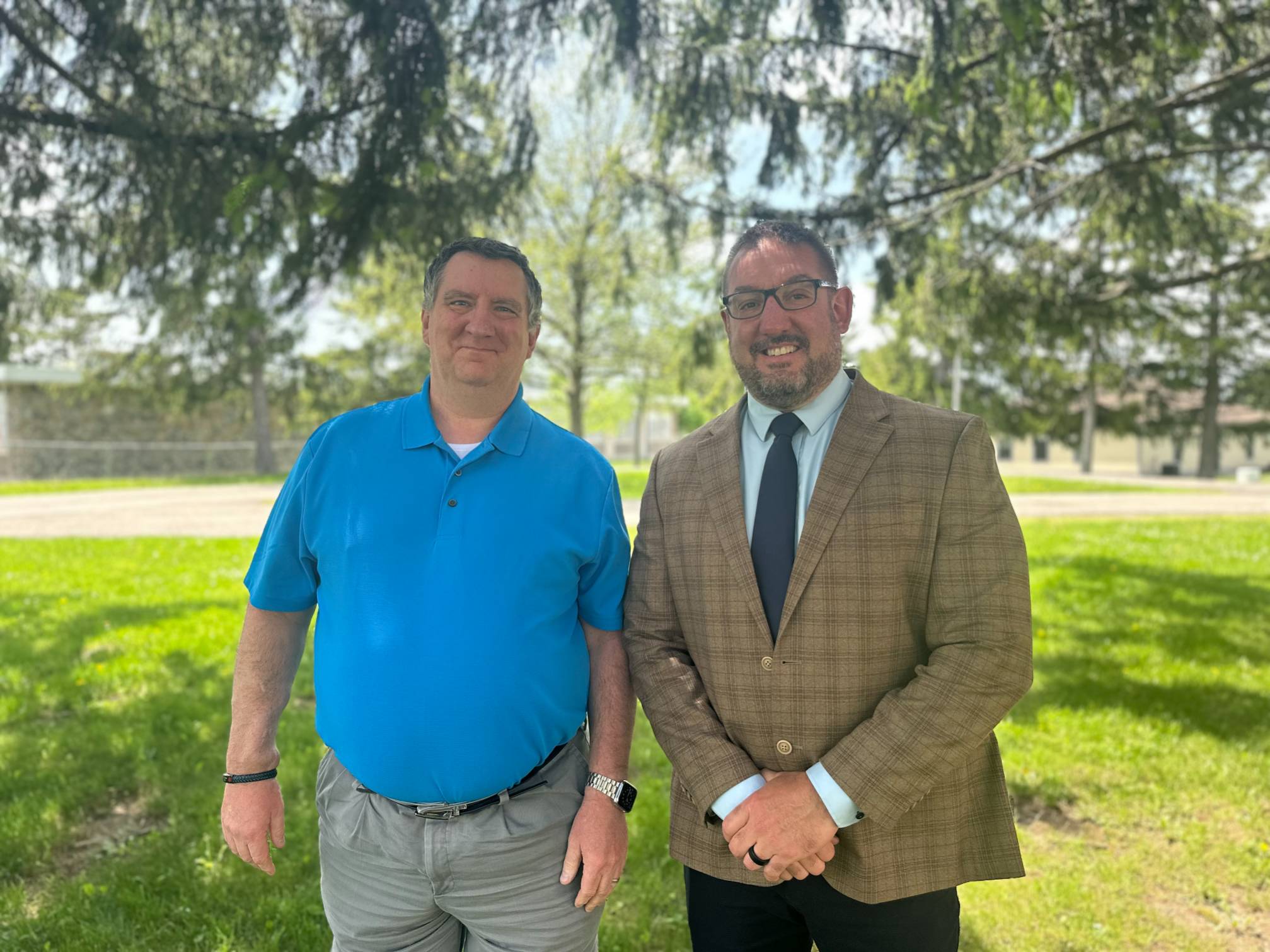 Employee Recognized for 30 Years of Service Posing with the College President