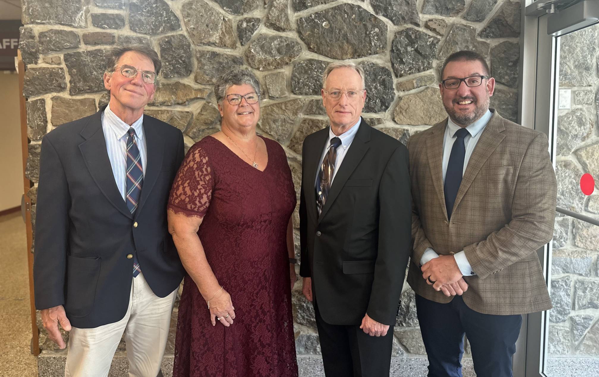Trustees, Retiree, and President Posing for Photo