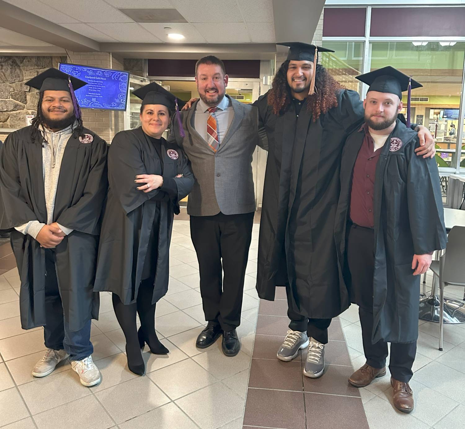 Graduates with President Dupee at Senior Send-off