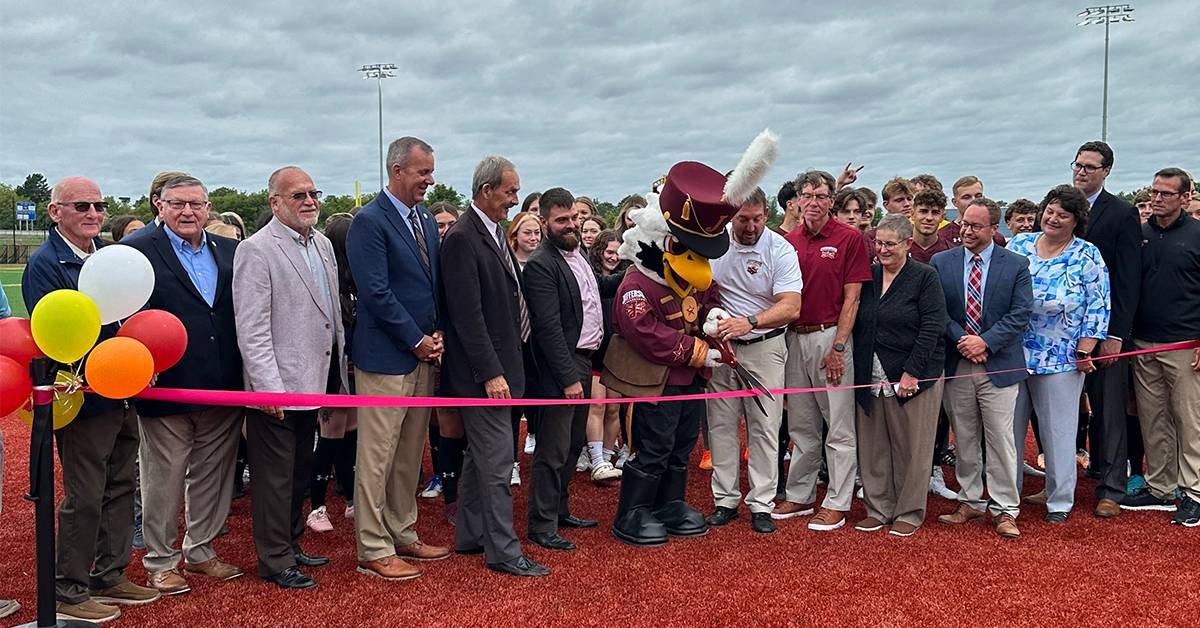 Image of turf field ribbon cutting